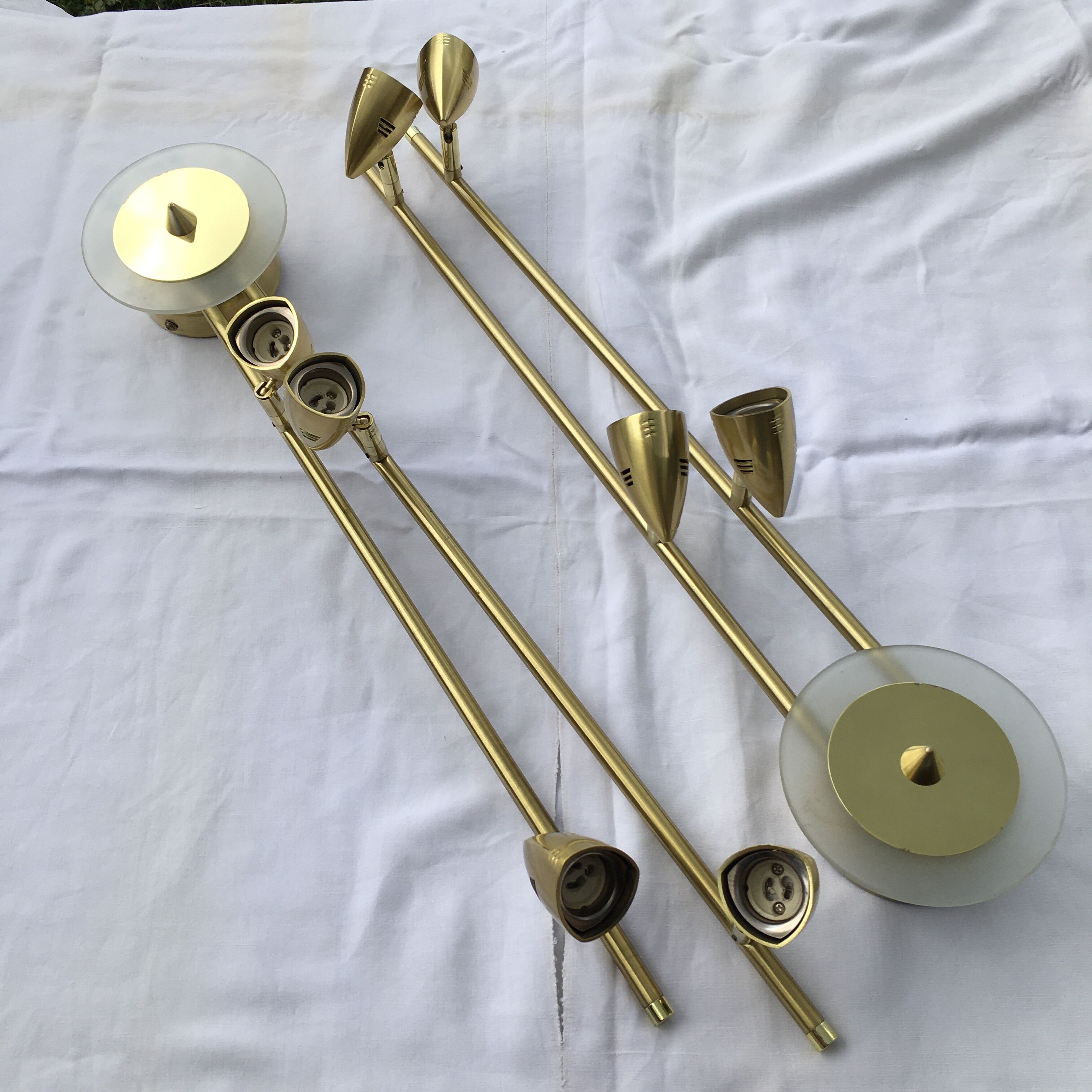 Pair of gold brass design sconces
