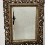 Napoleon III style mirror in carved wood, 20th century.