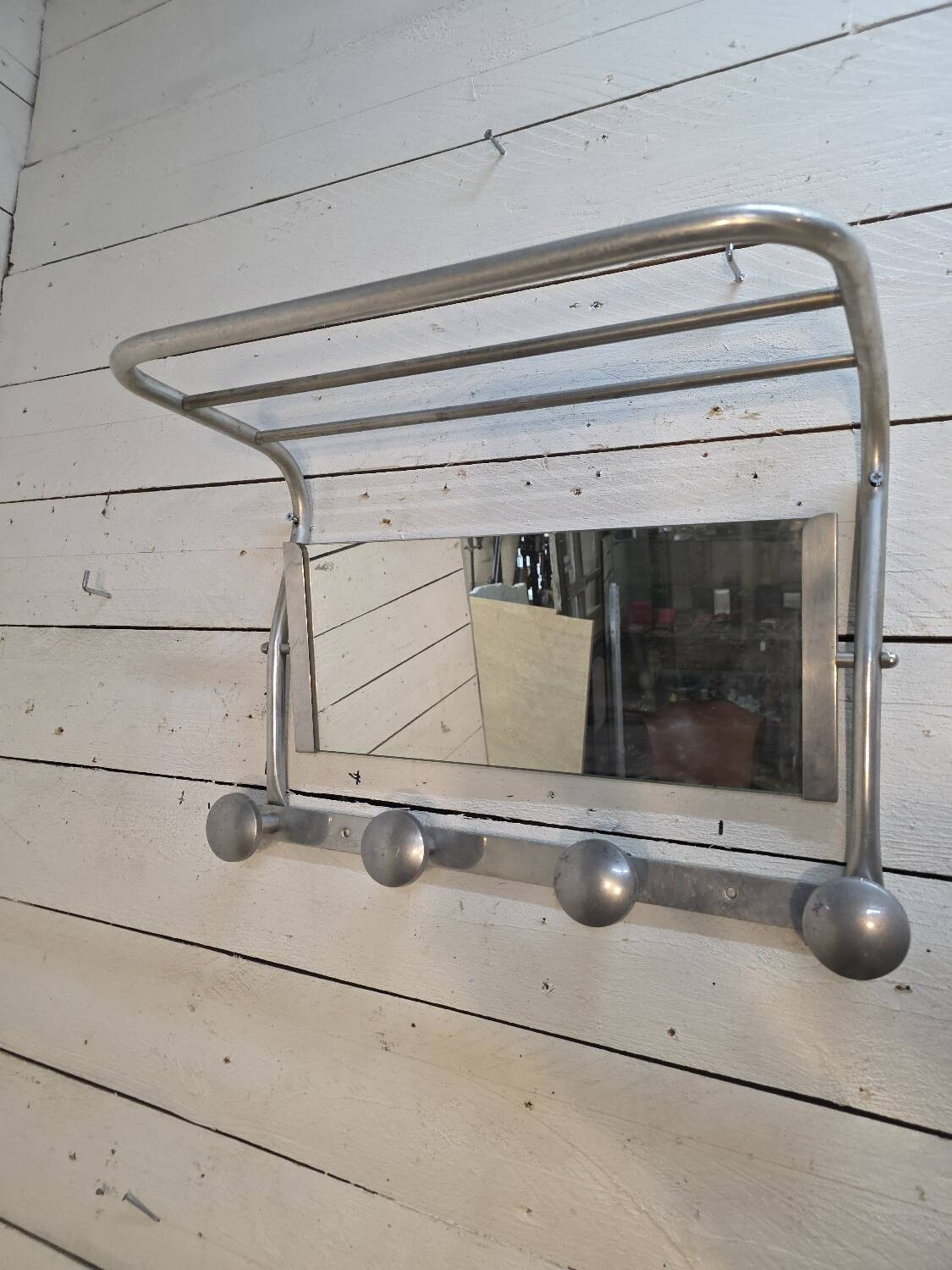 1960s swivel mirrored aluminum coat rack