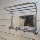 1960s swivel mirrored aluminum coat rack