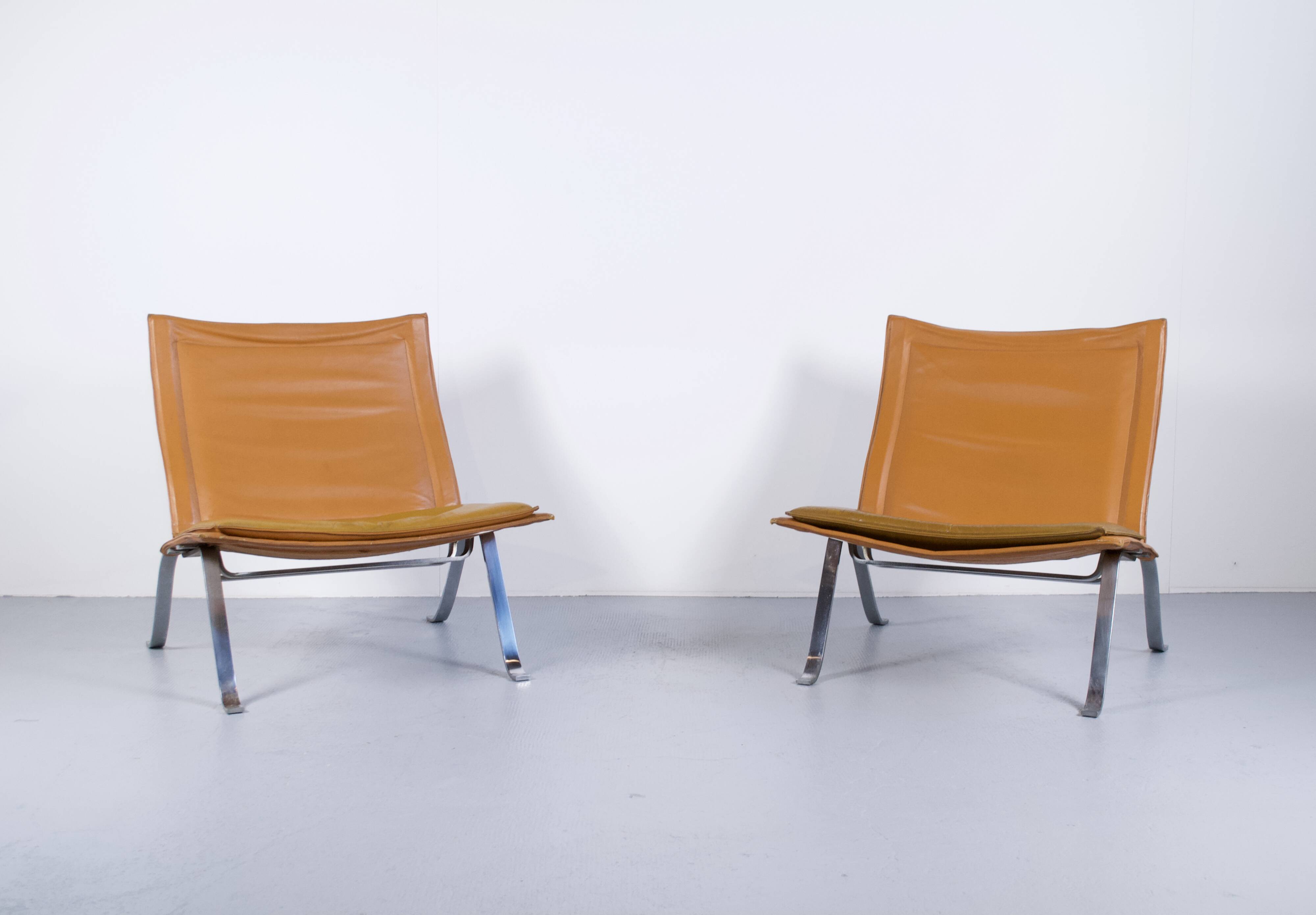 Imposing pair of leather and steel armchairs from the 1960s