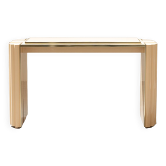 Delon console distributed by Maison Jansen in lacquered wood and brass from the 70s