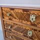 Commode Chiffonnier d'époque Louis XVI en marqueterie