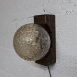 1960s ball wall light in dark wood and amber glass