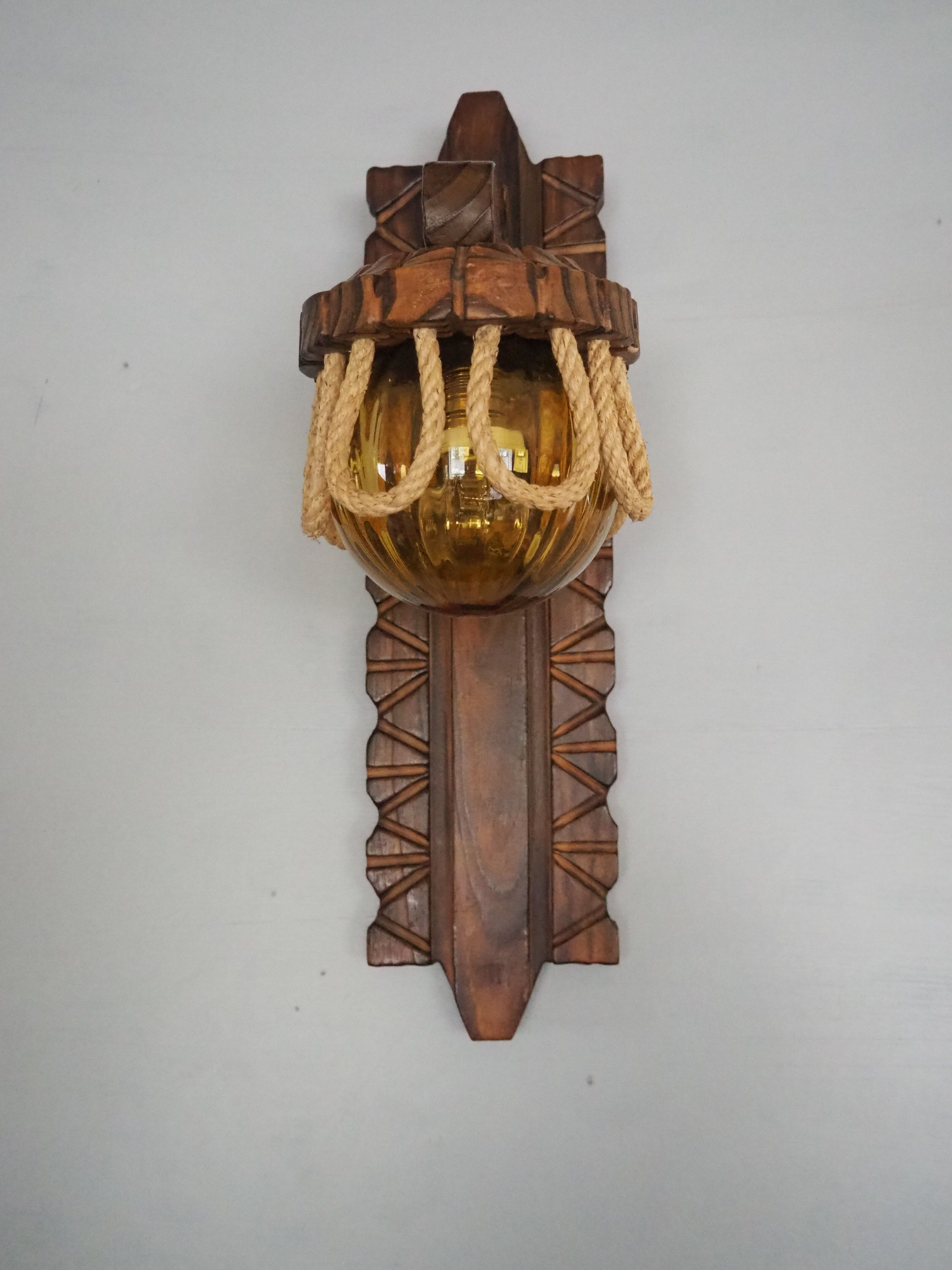 Sconce in wood and yellow glass ball from the 1960/1970