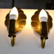 Pair of brass leaf wall lights from the 1970s.