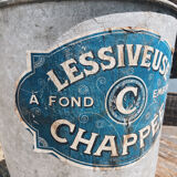 Lessiveuse ancienne en zinc avec son étiquette d’origine et son couvercle.
