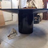 Black lacquered glass table and glass in the hoof style, Italy.