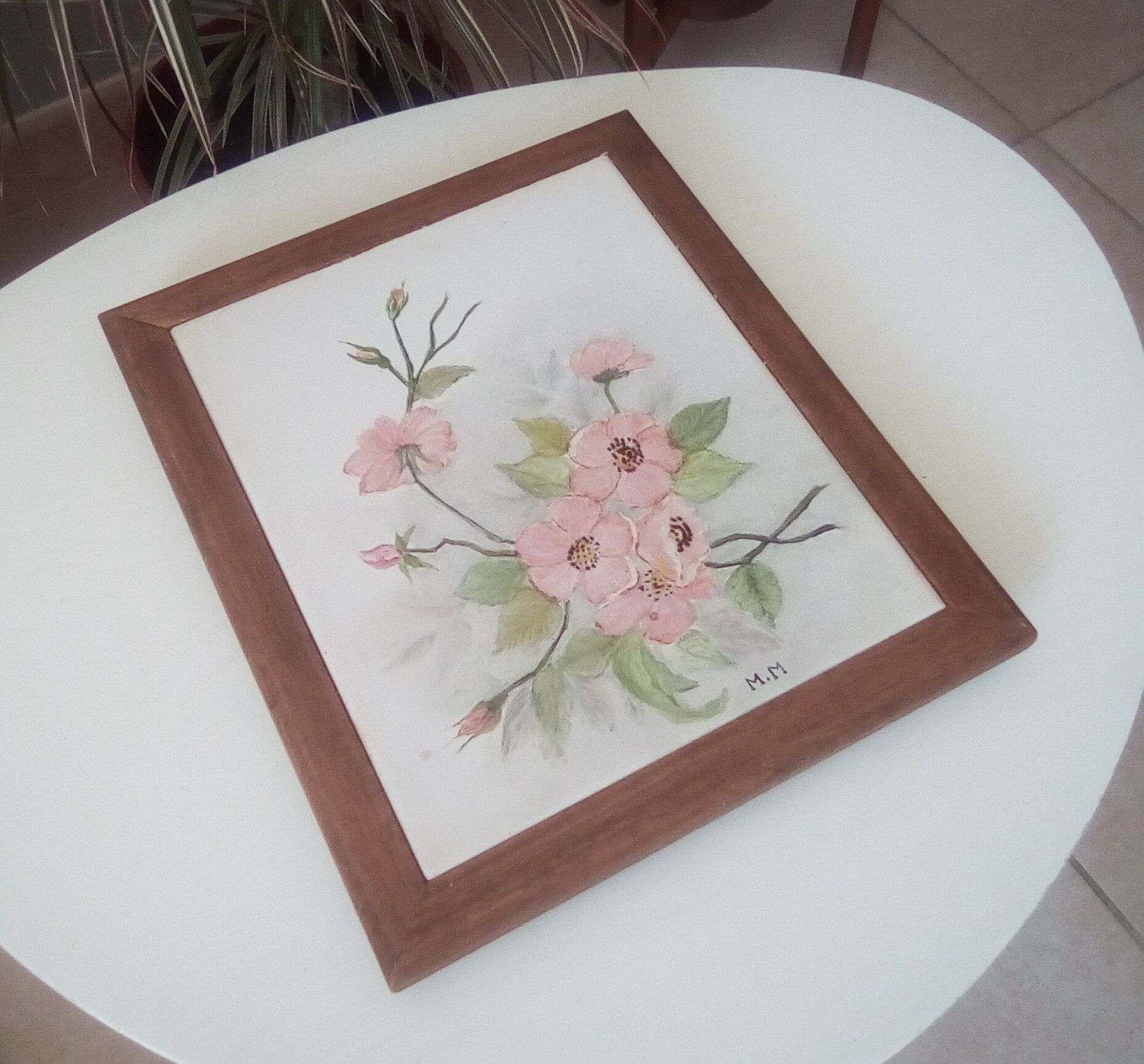 Underside of vintage wood and ceramic dish