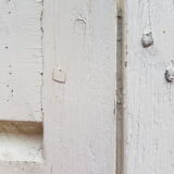 Pair of old shutters with louvers