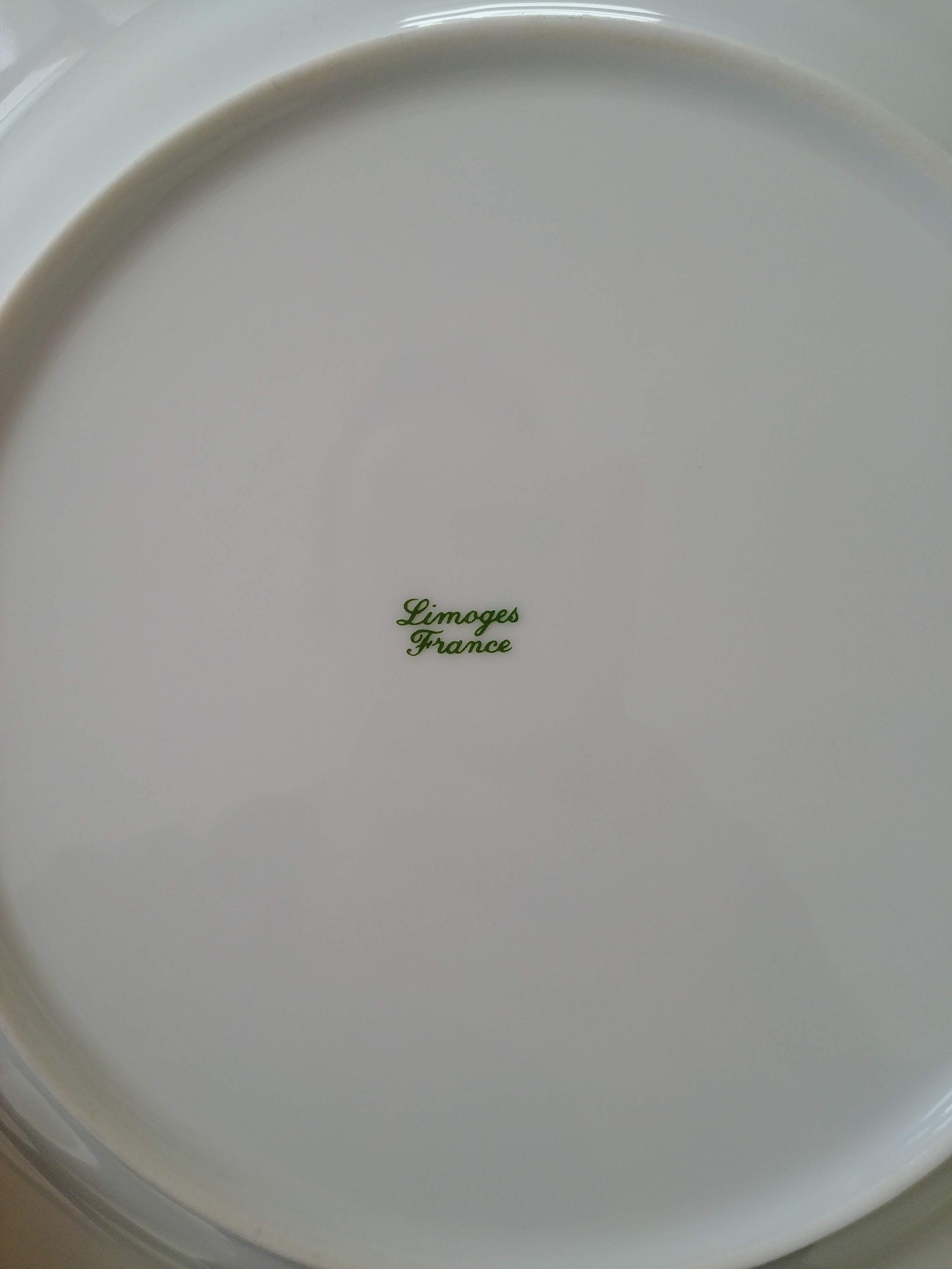8 Limoges plates