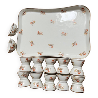 Service 13 pièces (10 coquetiers diabolo, 2 salerons et plateau de service) porcelaine de Limoges