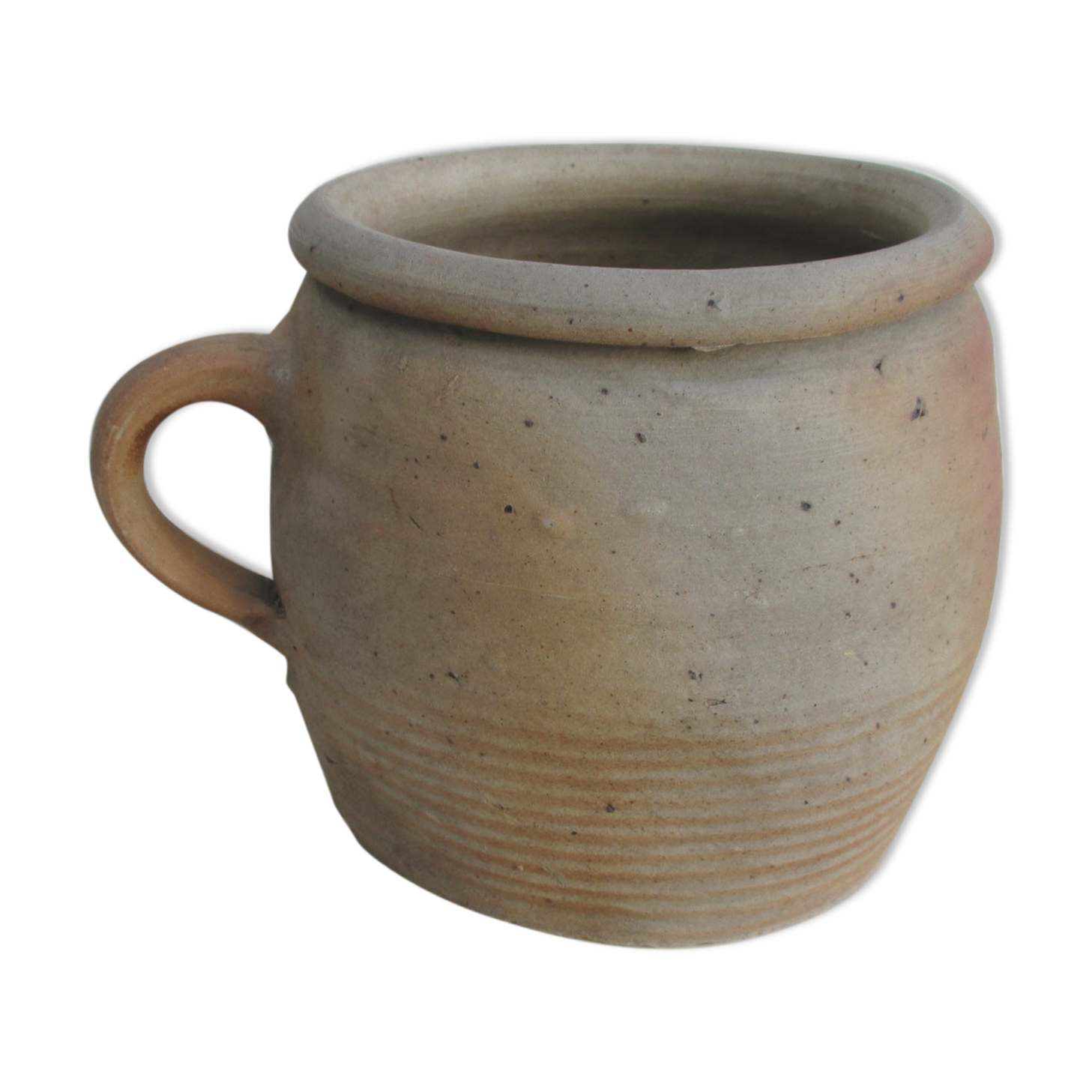 Ancient sandstone pot at one handle