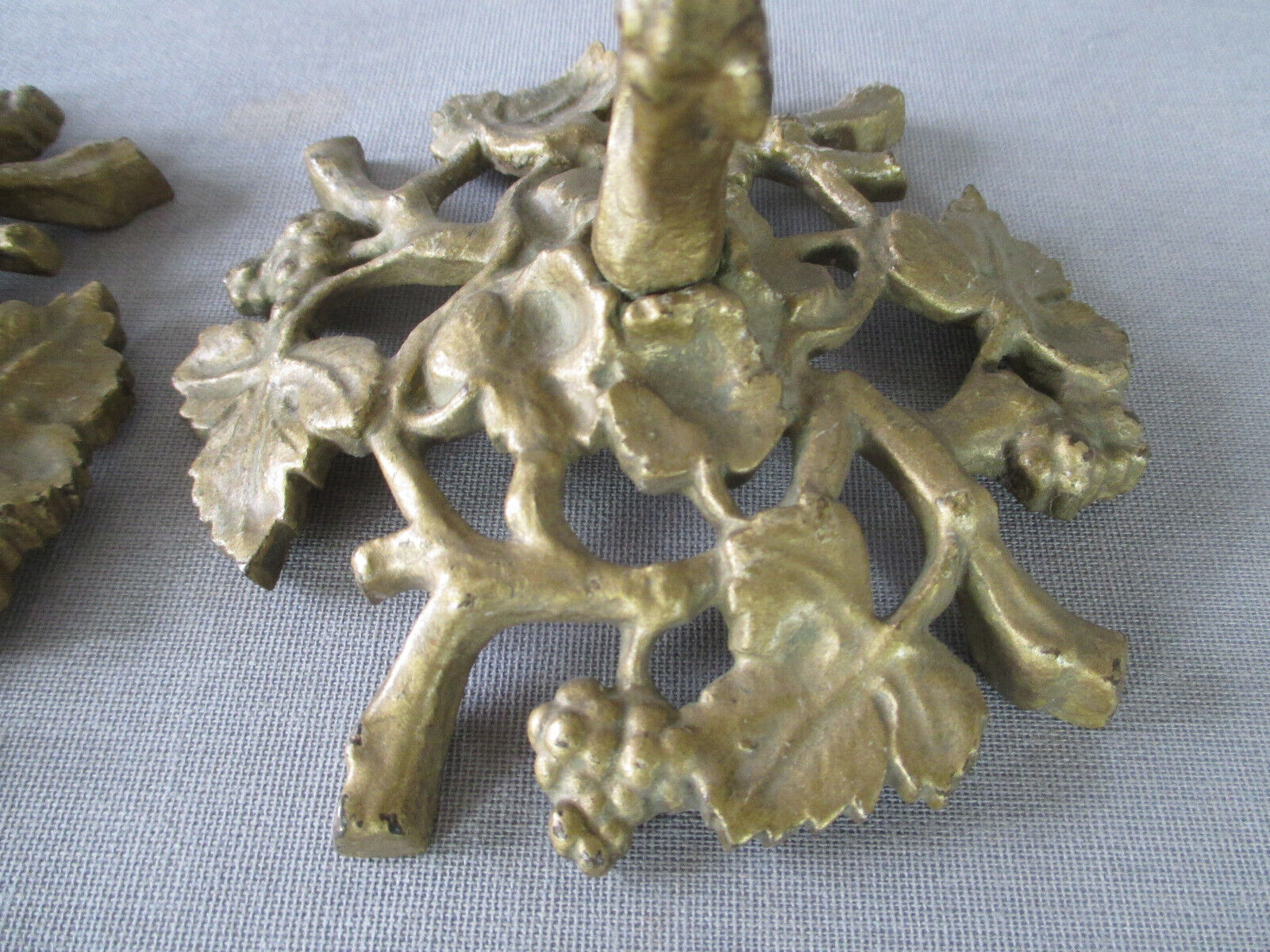 Pair of gilded bronze candlesticks with vine décor