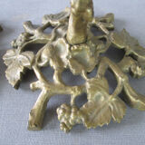 Pair of gilded bronze candlesticks with vine décor