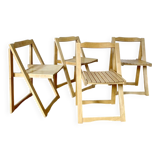 Folding chairs designed by Aldo Jacober in solid beech wood.