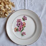 Flat antique earthenware plates with gilded edges