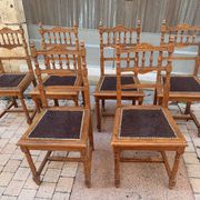 Set of 6 antique turned wooden chairs with embossed leather seats.