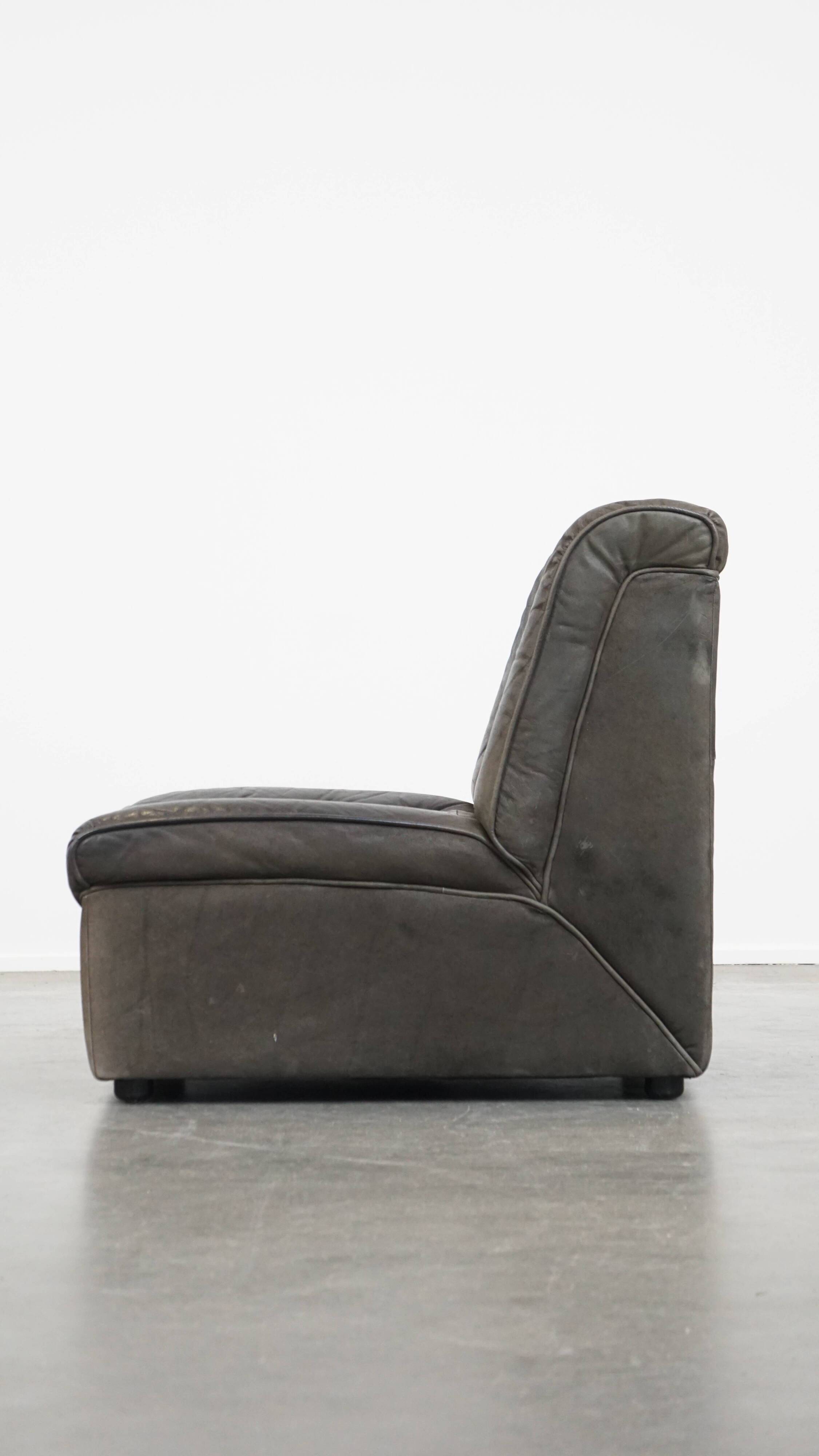 Canapé design modulable en cuir gris, 3 modules et 1 repose-pieds