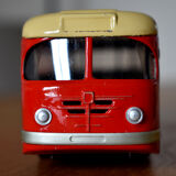 2th century painted sheet metal bus