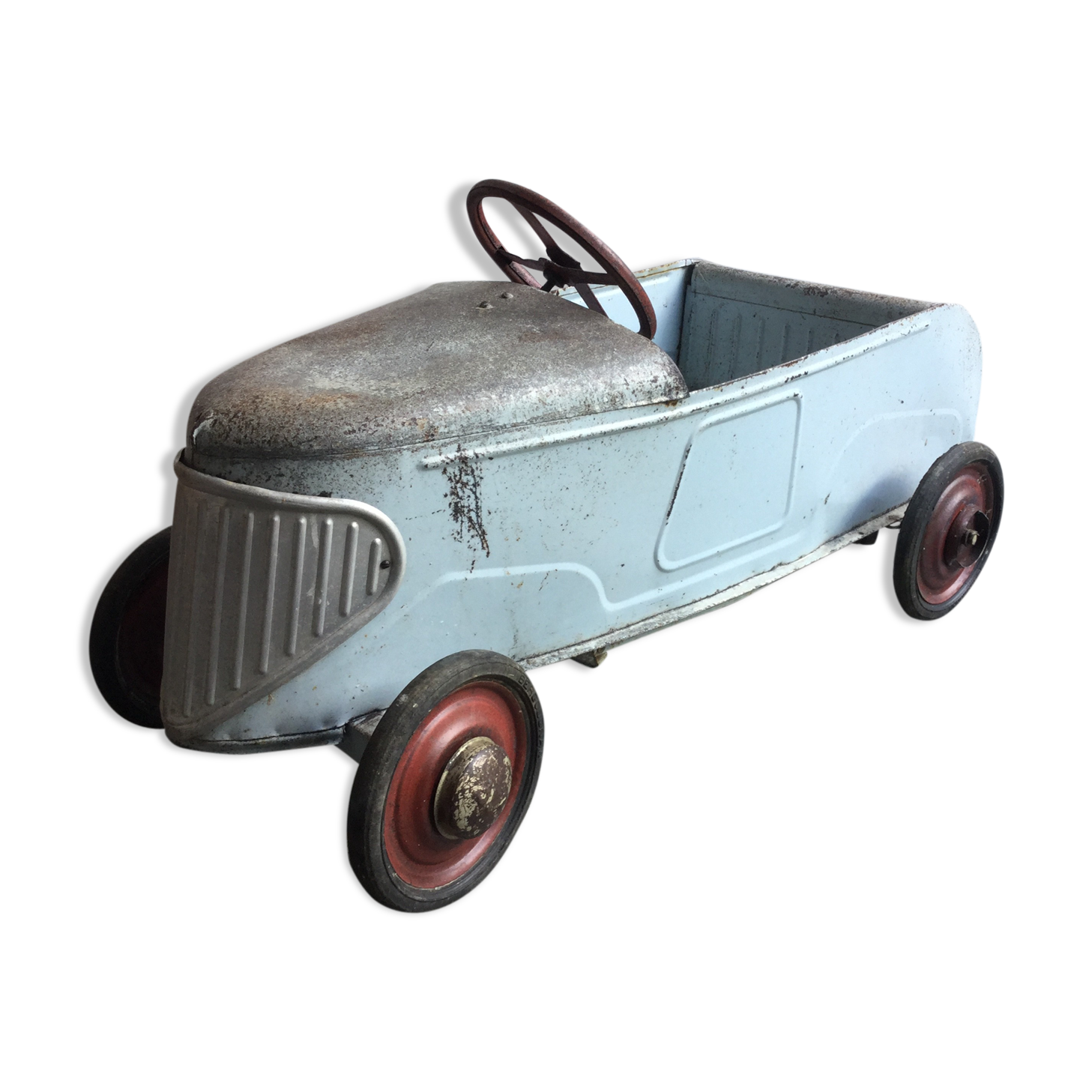 Old metal pedal car 1930