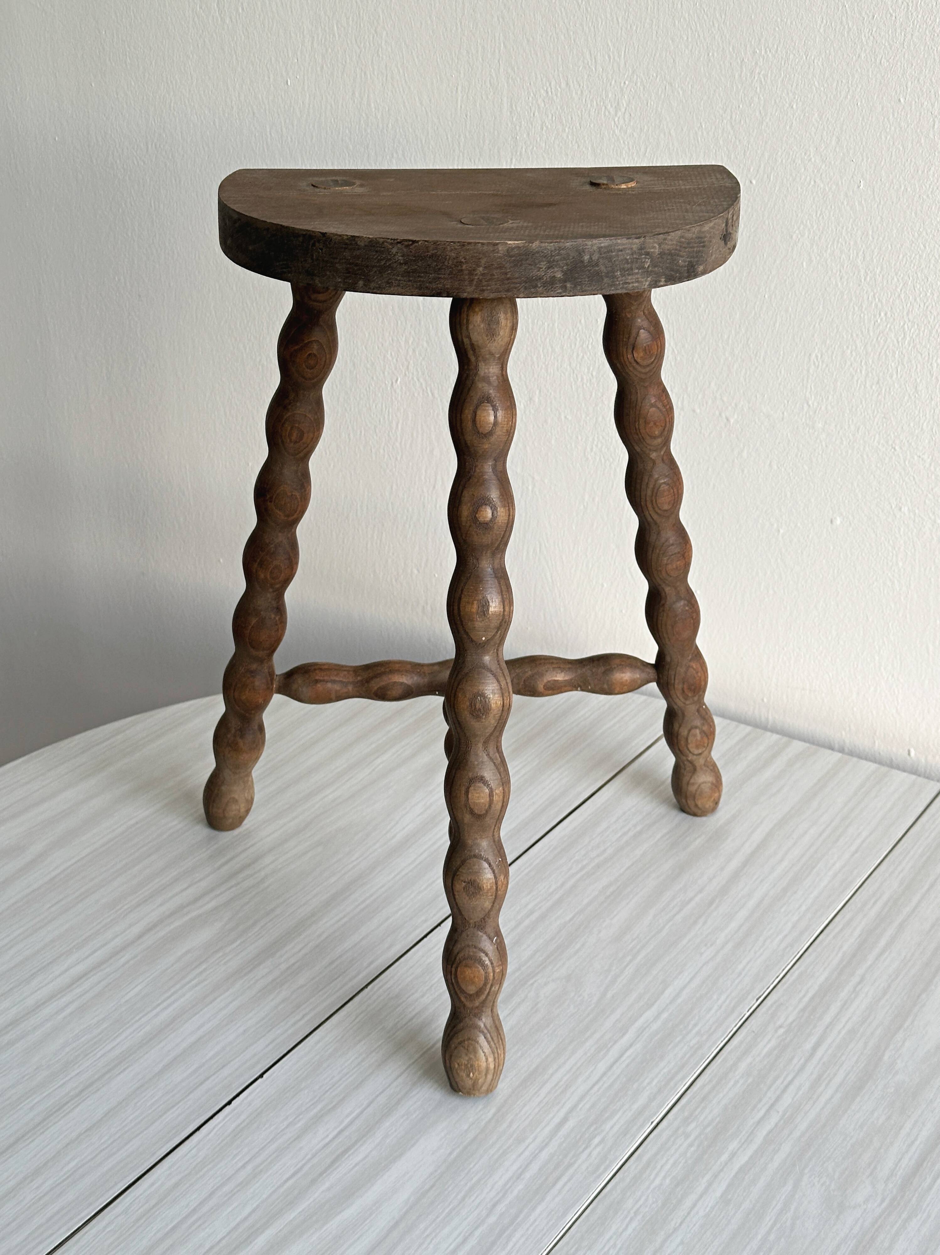 Tripod stool with turned wooden legs