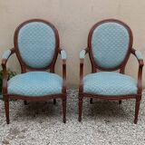 Paire de fauteuils médaillon style Louis XVI