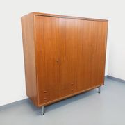 Vintage Scandinavian modernist wardrobe in teak and metal from the 1960s.