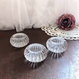 Trio of salt shakers, pepper shakers, molded glass salt shakers