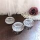 Trio of salt shakers, pepper shakers, molded glass salt shakers