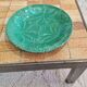 8 green barbotine plates from the early 20th century.