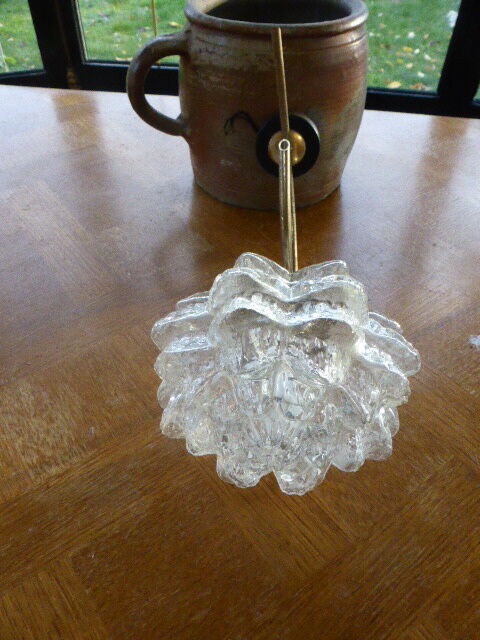 Brass wall sconce with globe in the shape of vintage 1960s flowers