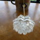 Brass wall sconce with globe in the shape of vintage 1960s flowers