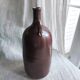 Large burgundy jar