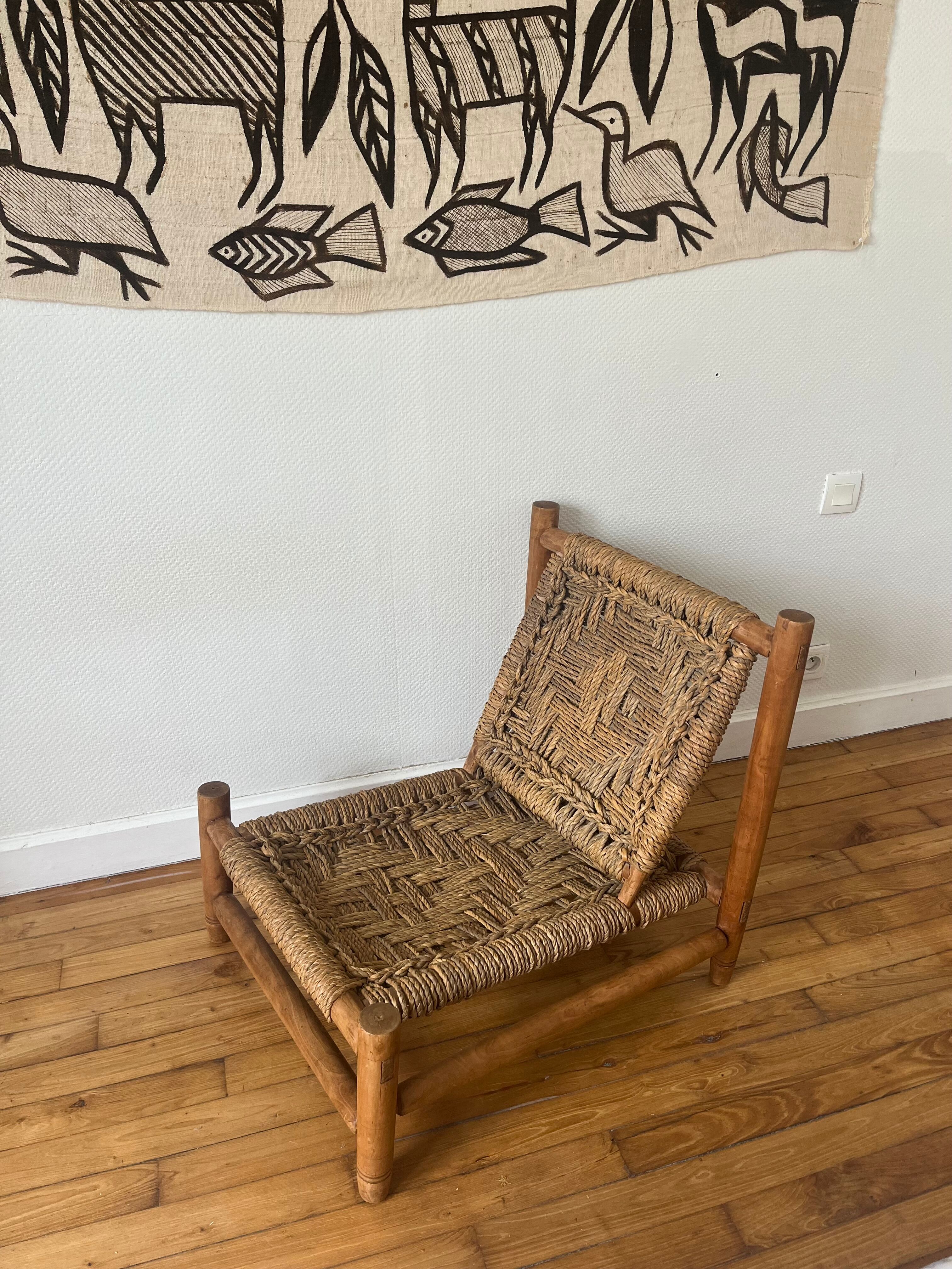 Wood and rope armchair by Audoux and Minnet from the 1950s.