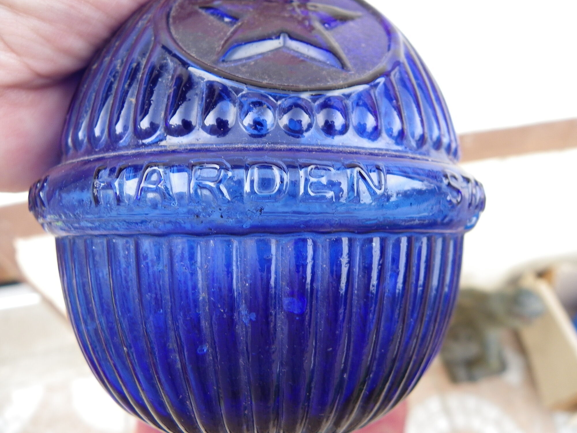 HARDEN fireplace fire extinguishing grenade in fluted blue glass, marked "Star". Rare decoration