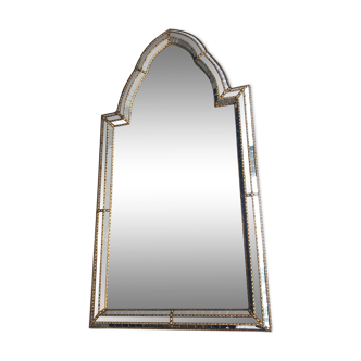 Mirror consisting of multi-faceted mirrors and brass garlands, French work, around 1970