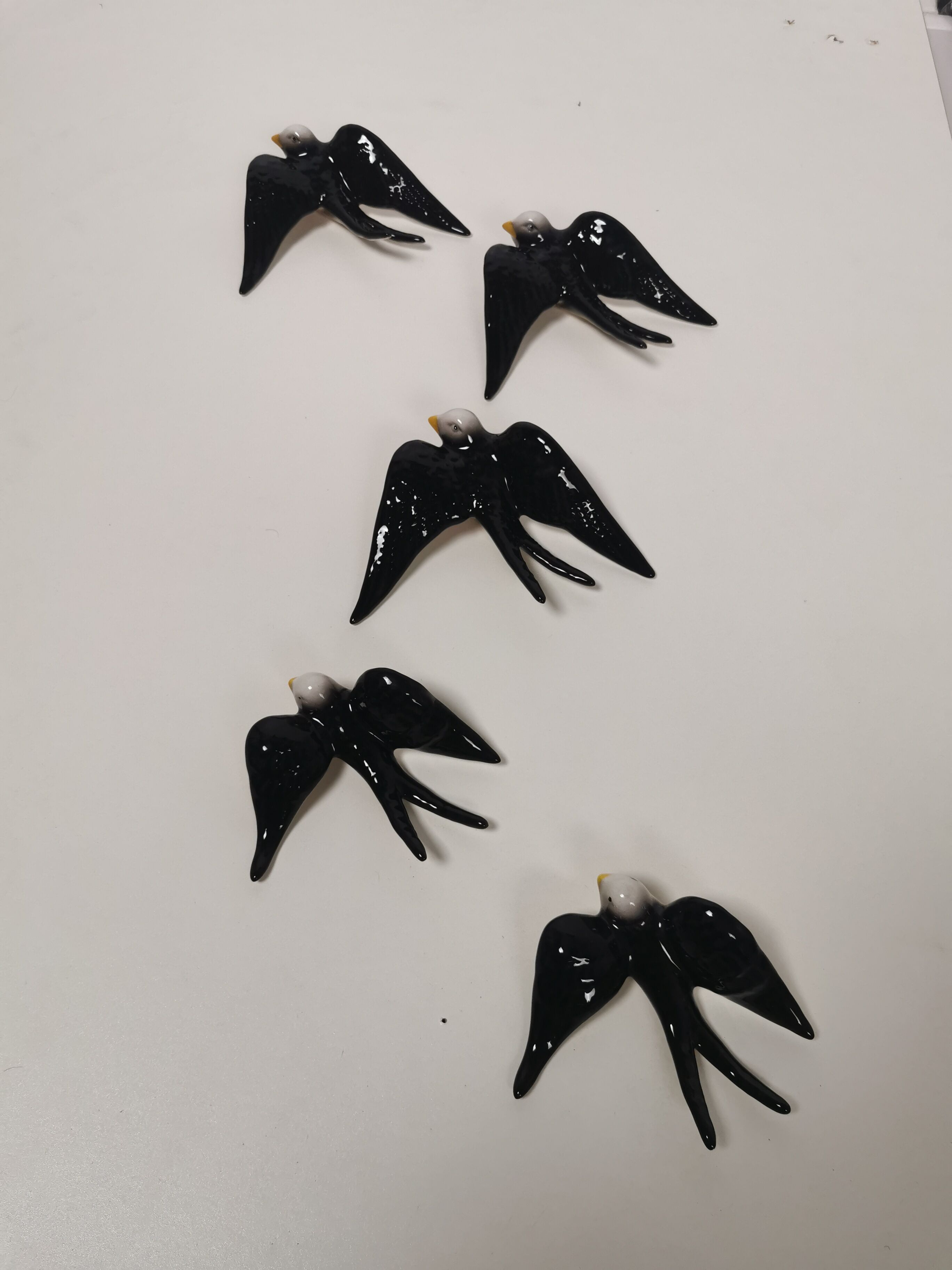 Batch of ceramic swallows
