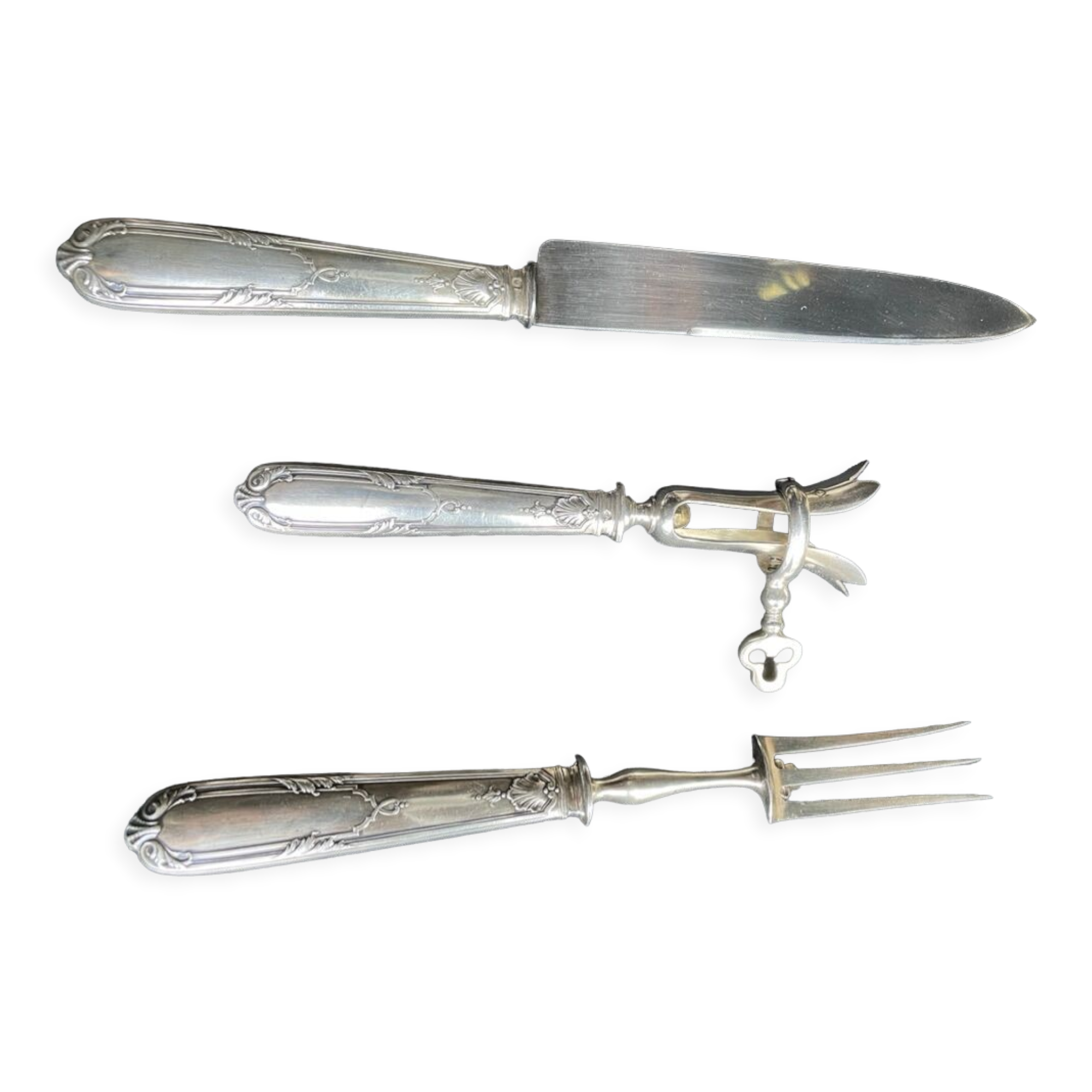 Silver cutting service Minerva Louis XV style