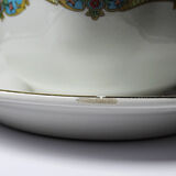 Old Lunéville sauce boat, opaque porcelain with polychrome decoration.