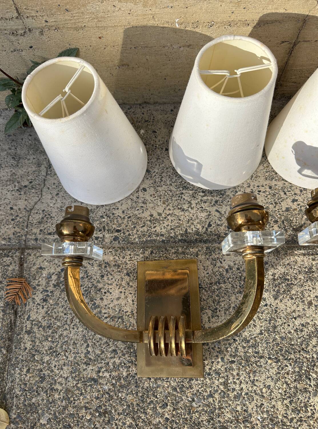 Antique Art Deco wall sconces attributed to Jacques Adnet.