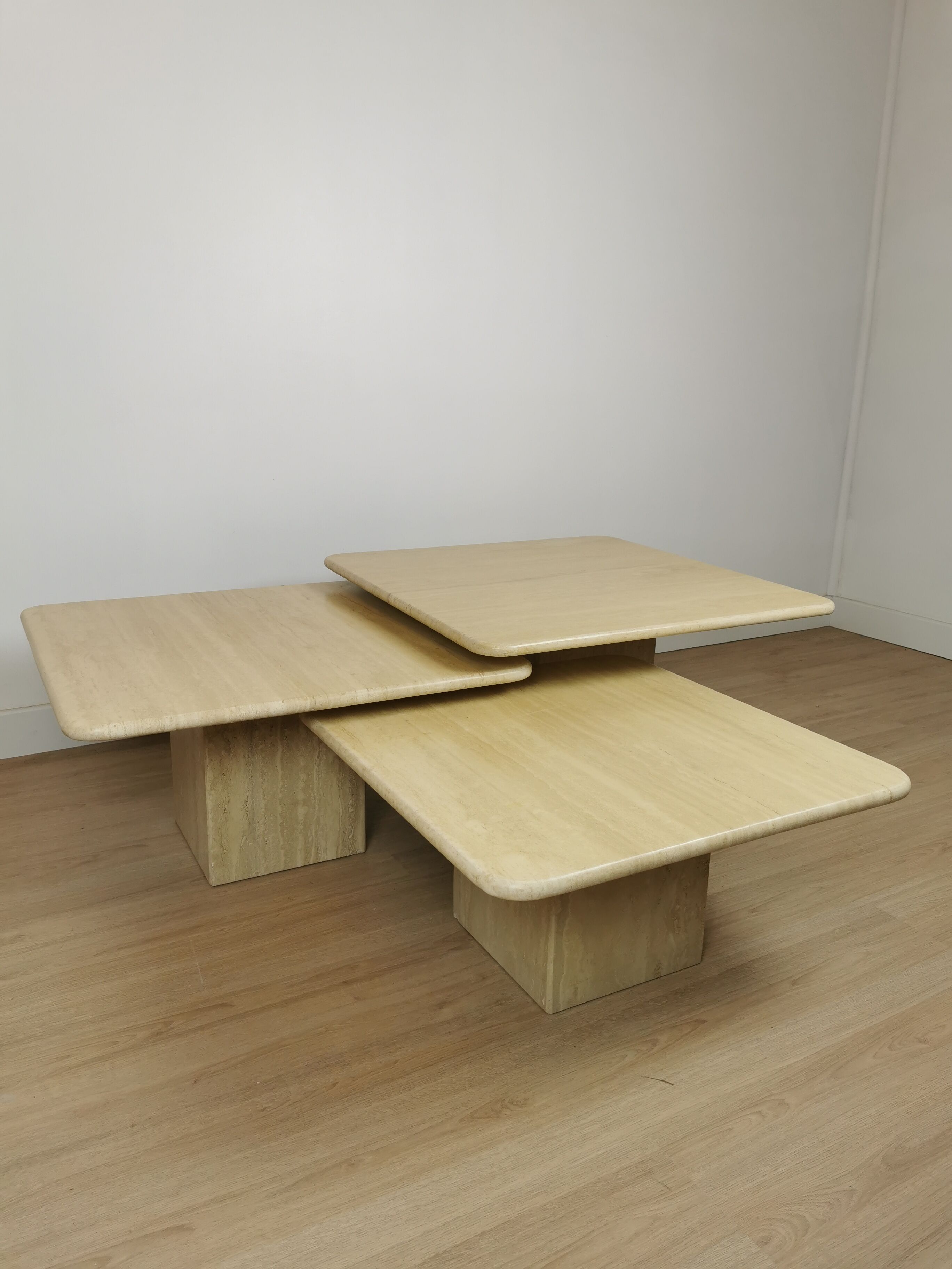 Side tables in travertine 70s