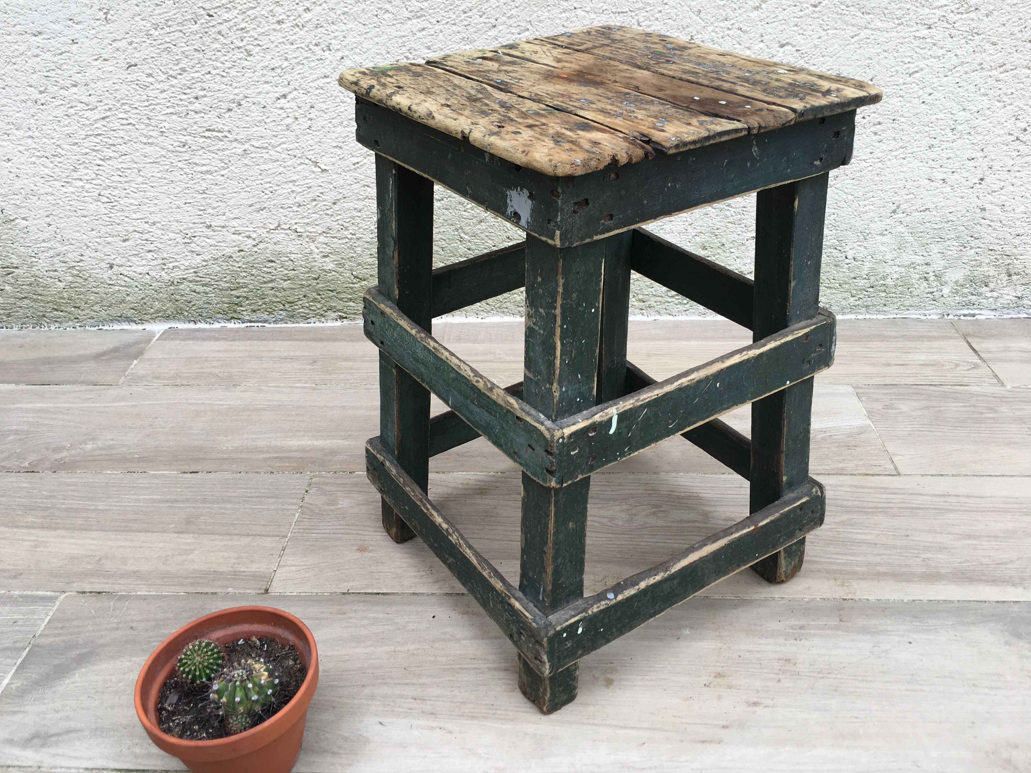 Former green workshop stool