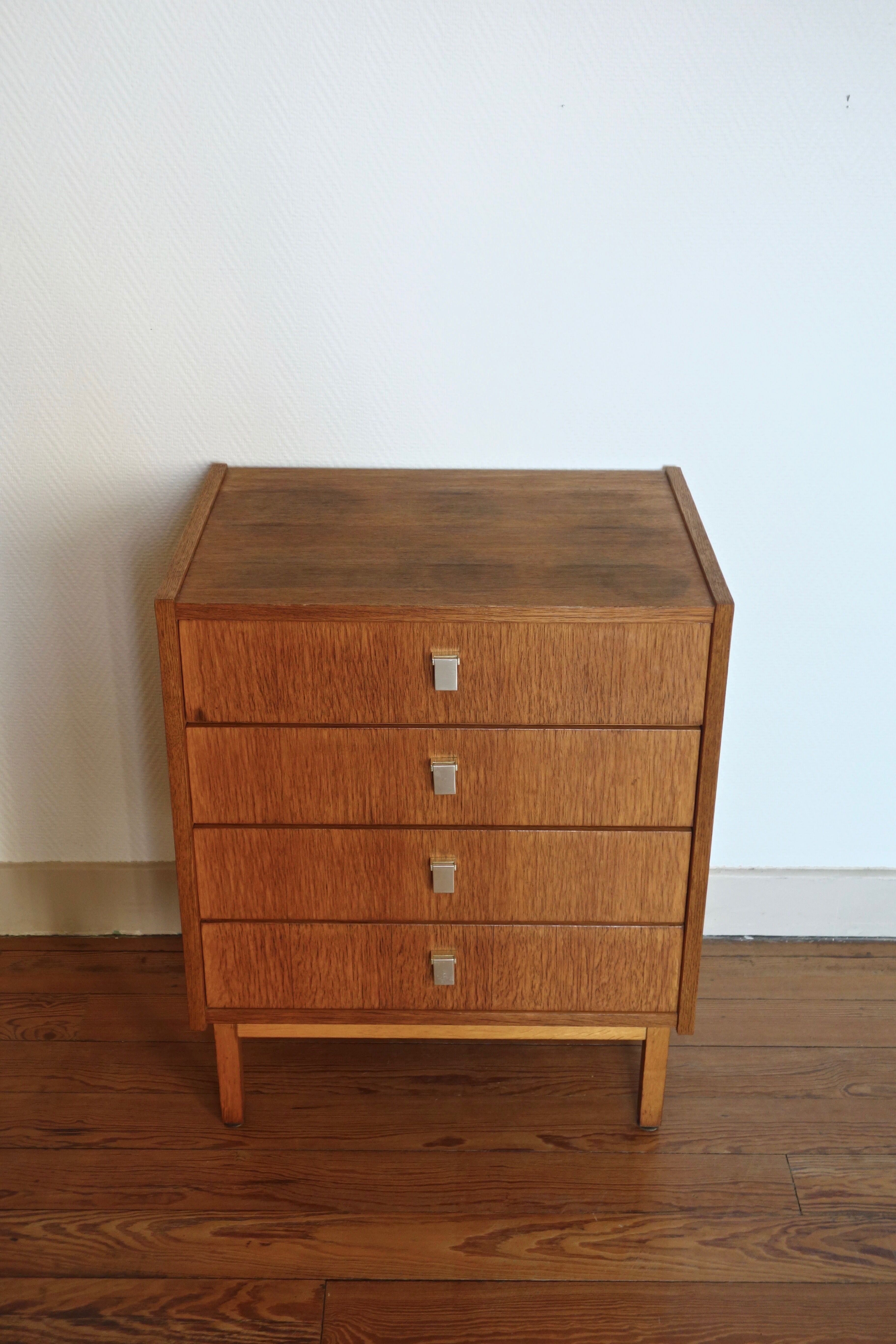 The 1950s oak chest of drawers