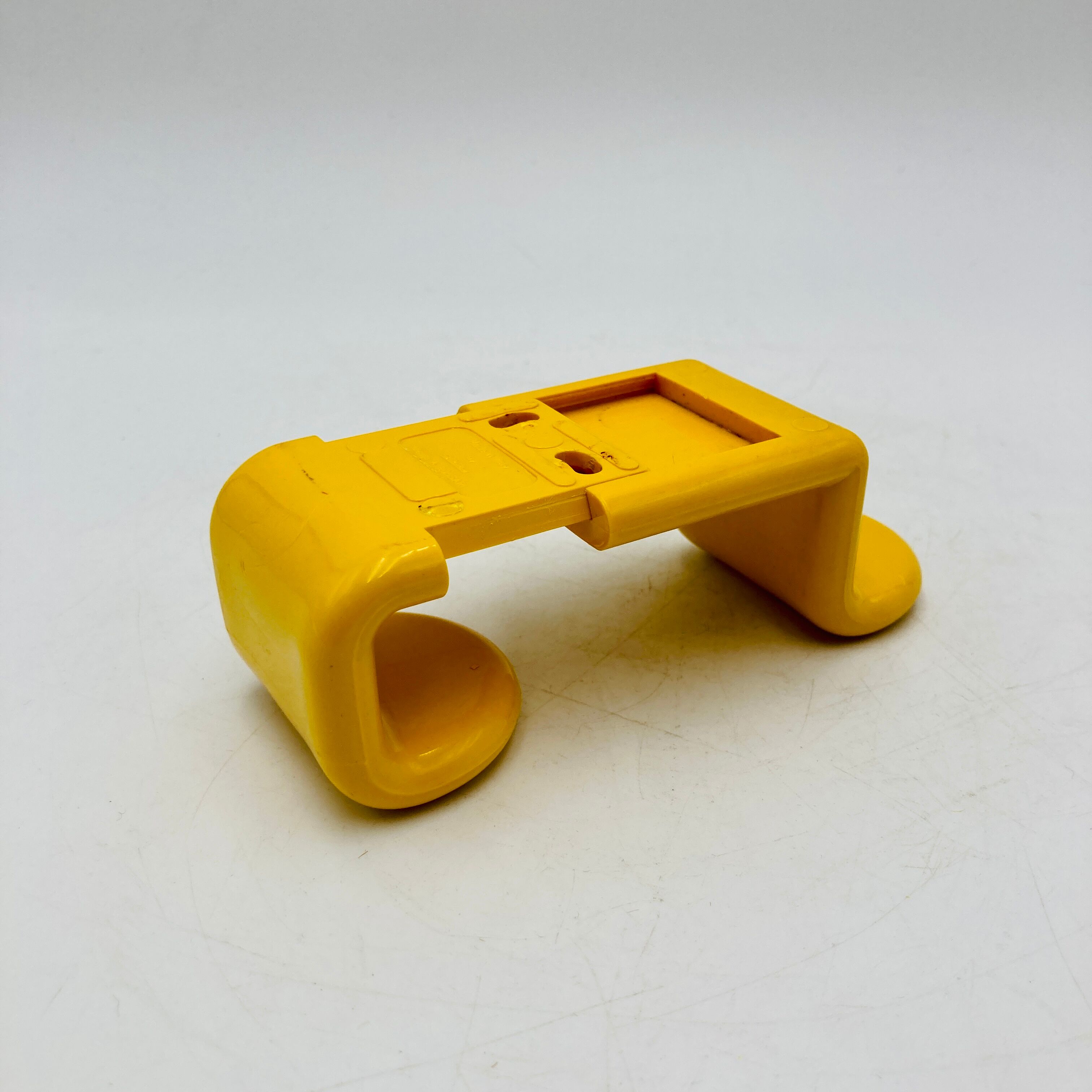 Yellow plastic hooks, design A. Rossari, Gedy edition.