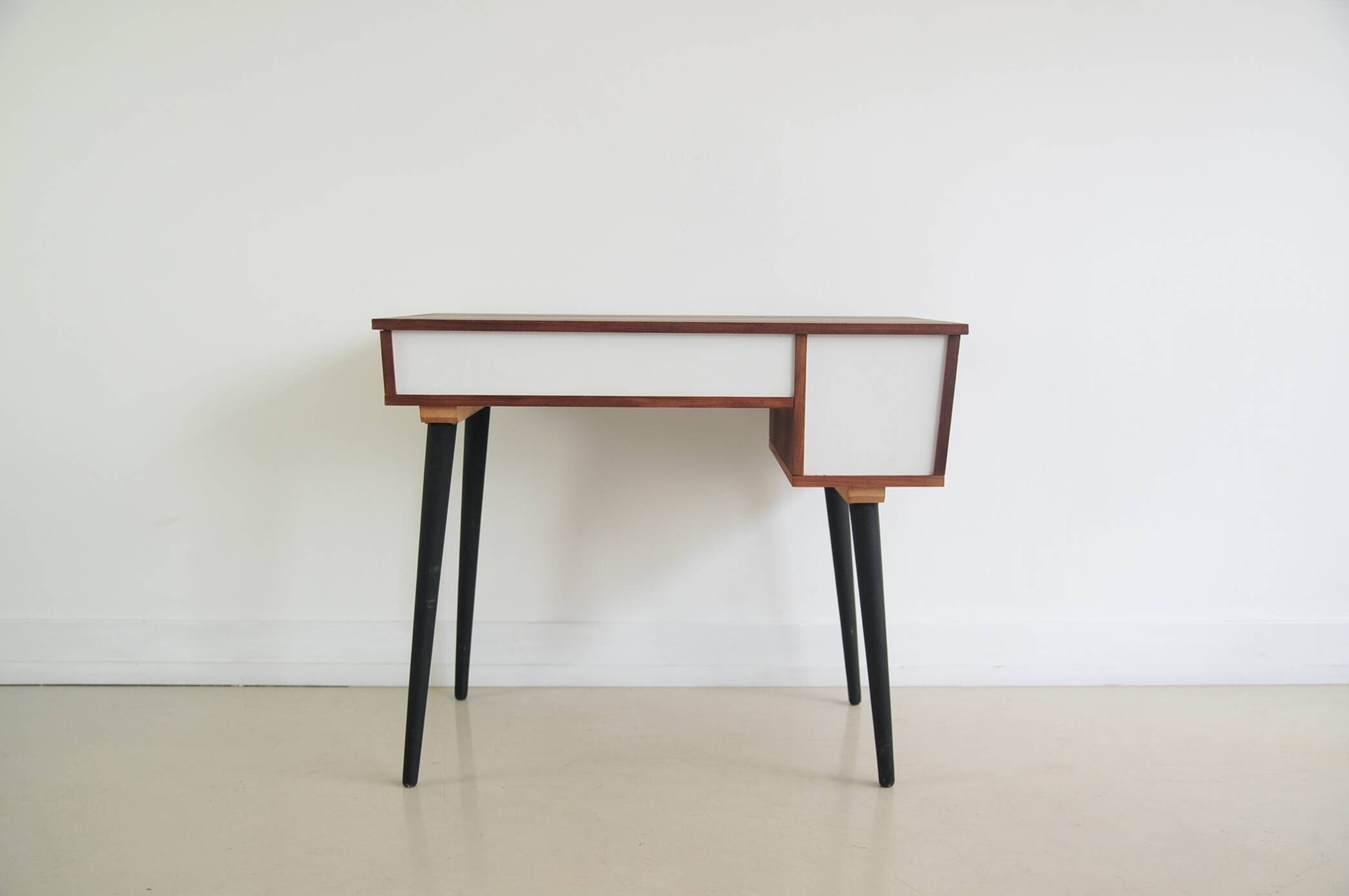 Vintage teak desk on black legs