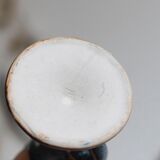 Antique candle holder in glazed ceramic