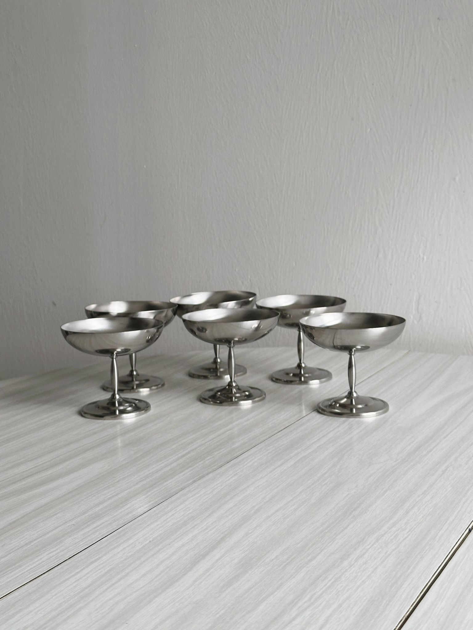 6 stainless steel dessert bowls on foot