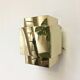 Cubical brass wall light