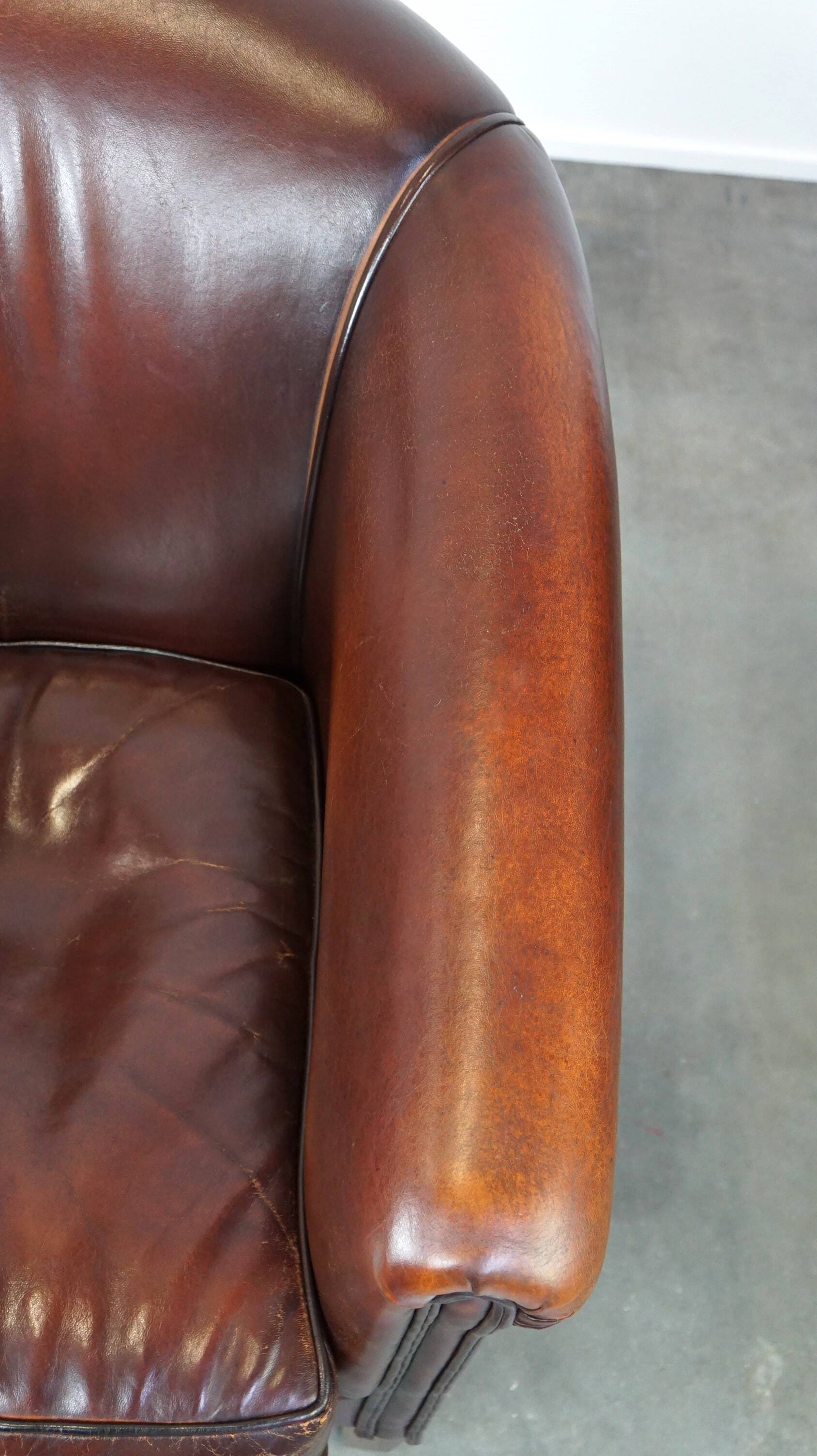 Nice sheepskin club chair with a beautiful patina